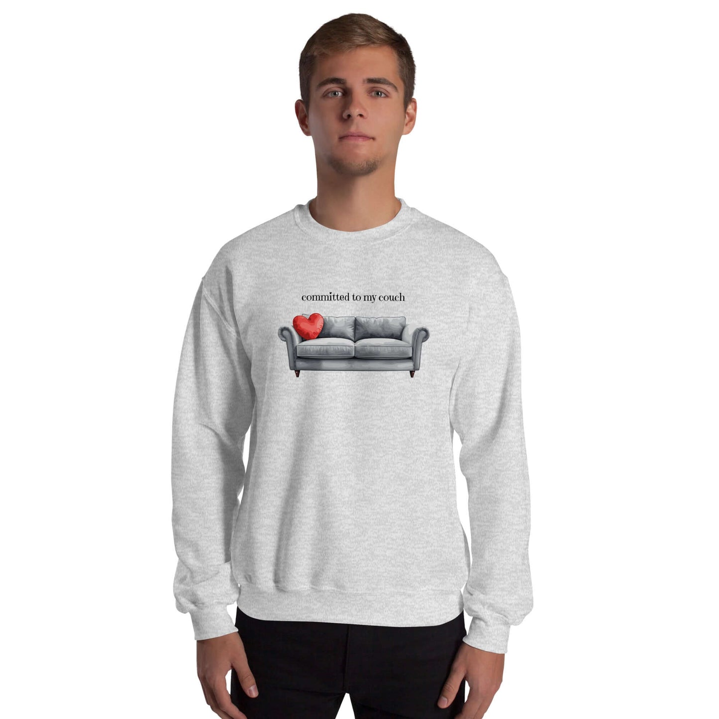 Unisex sweatshirt featuring a couch graphic and the text 'committed to my couch', perfect for self-care and relaxation.