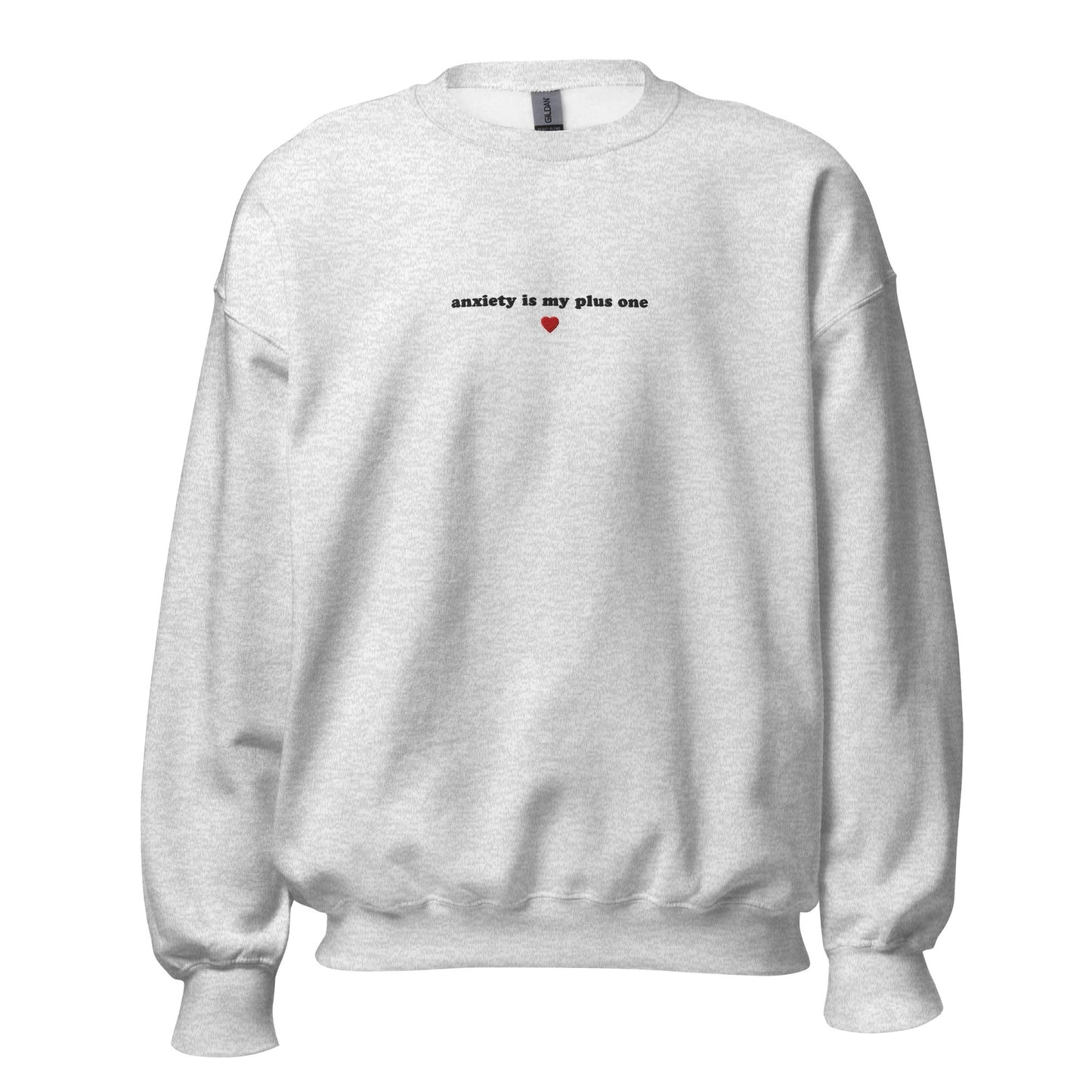 Grey embroidered unisex crewneck saying 'anxiety is my plus one' in black text with a heart, perfect for self-expression and mental health awareness.