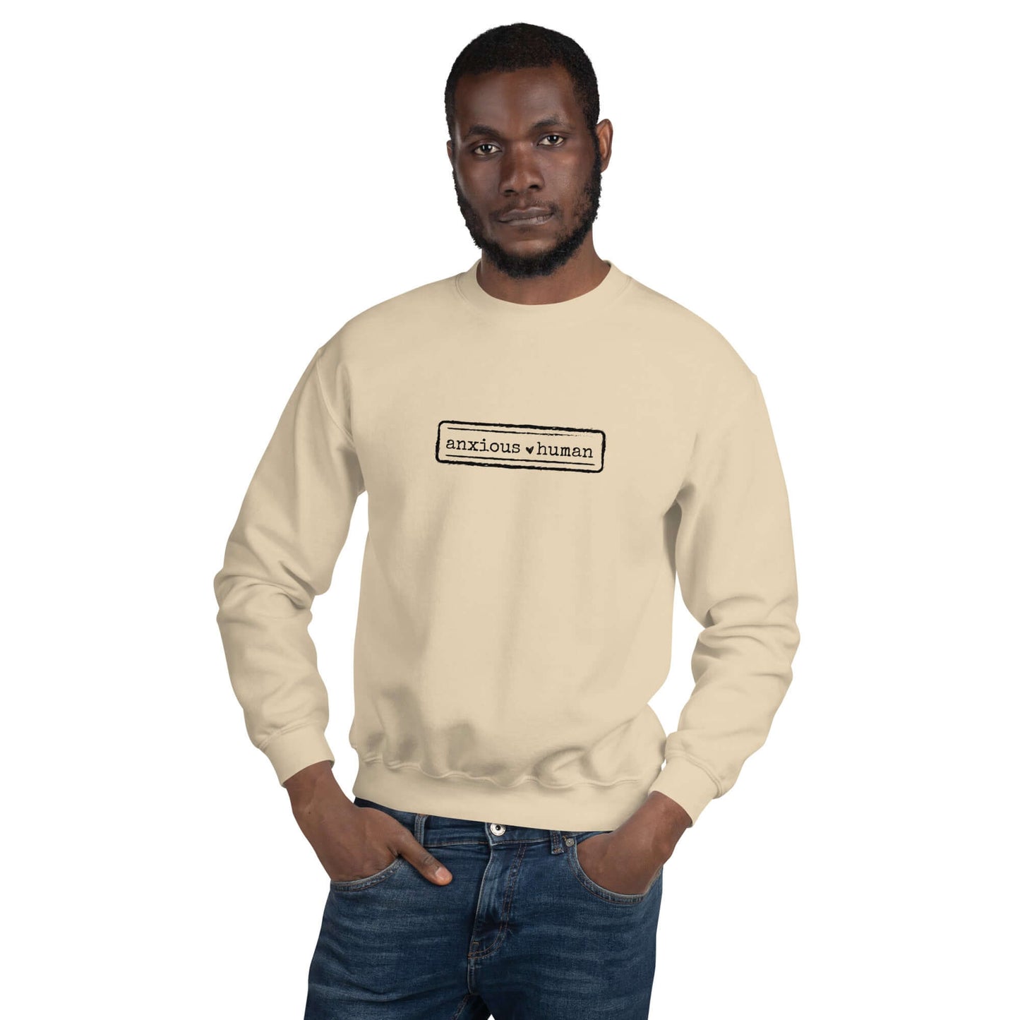 Male Model wearing Anxious Human unisex crewneck in sand beige, promoting mental health awareness and self-expression, perfect for gifting.