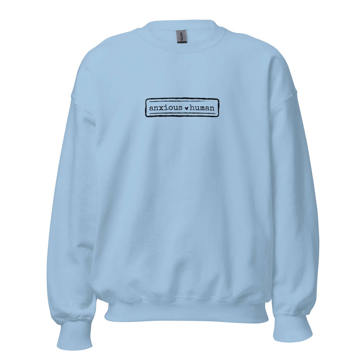 Light blue unisex sweatshirt featuring 'anxious human' text, promoting mental health awareness and self-expression.