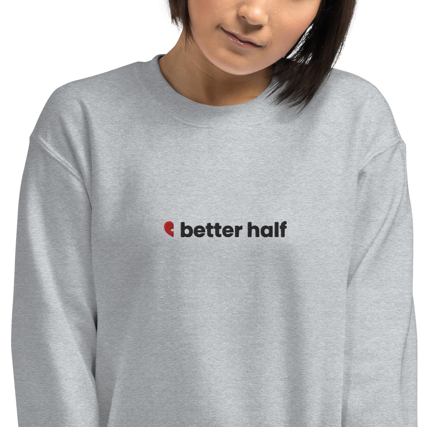 Model wearing a sport grey Better Half unisex embroidered crewneck sweatshirt, cozy and comfortable, perfect for Valentine's Day or self-love gifts.